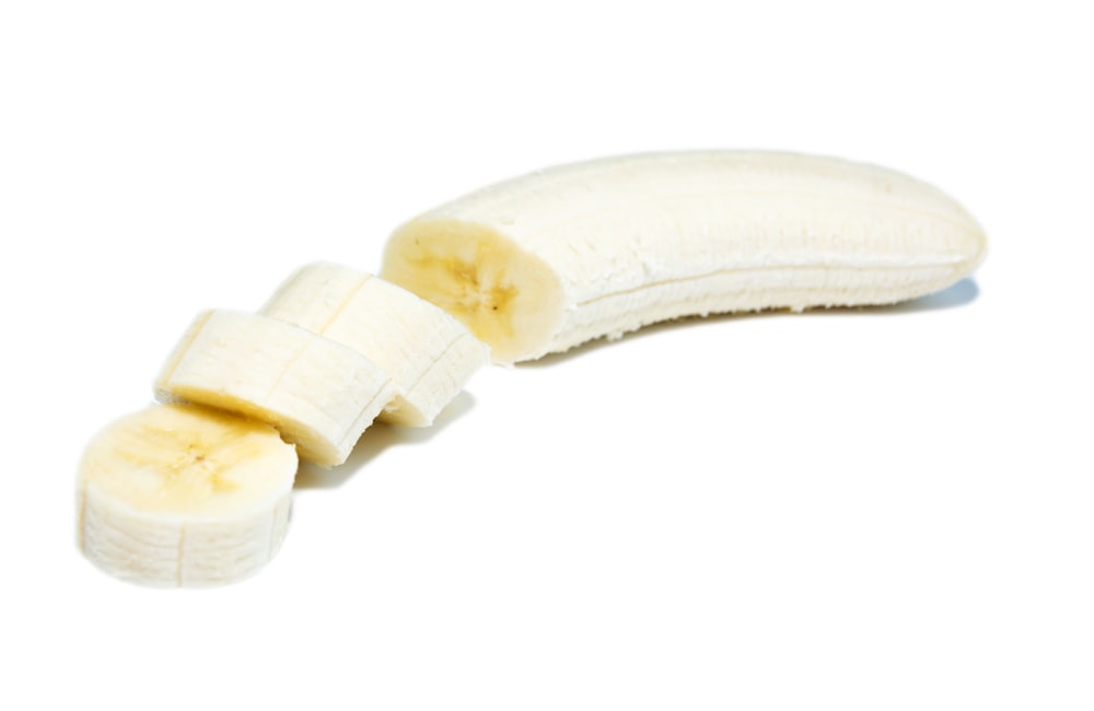 A peeled banana ready to be frozen
