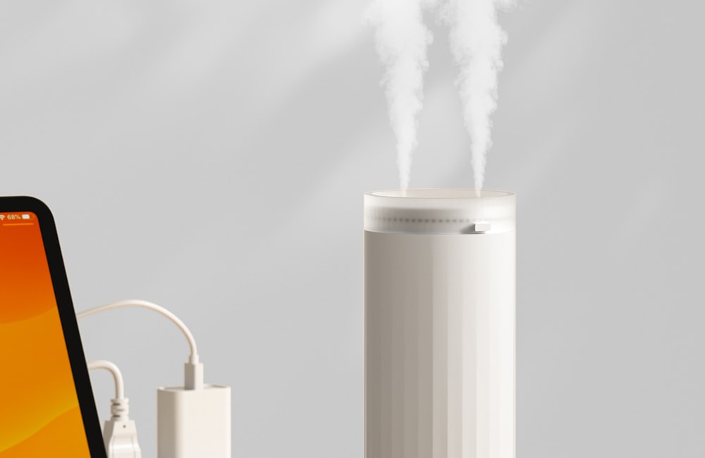 An essential oil diffuser releasing a fine mist